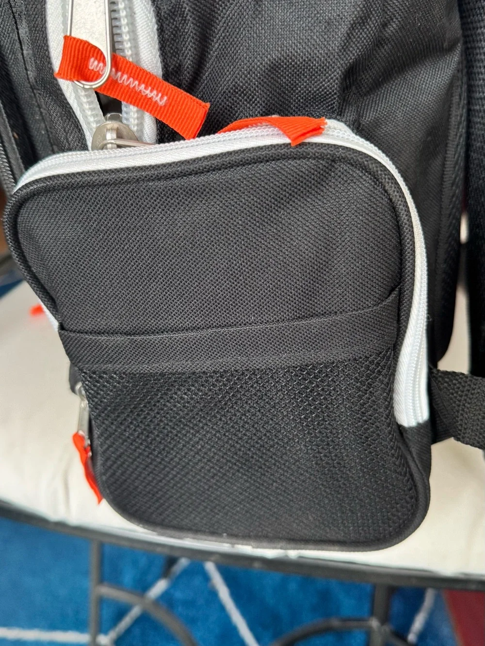Black & White Backpack with Orange Accents